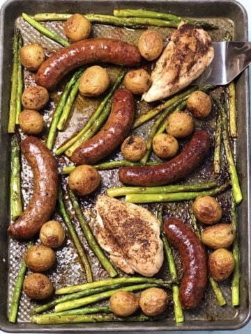 za'atar chicken and sausage on a sheet pan