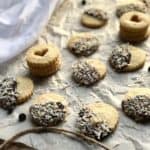 cardamom-shortbread-cookies-with-chocolate-and-coconut on table