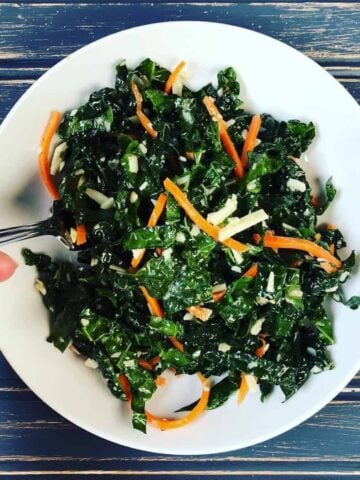 kale and carrot salad in bowl