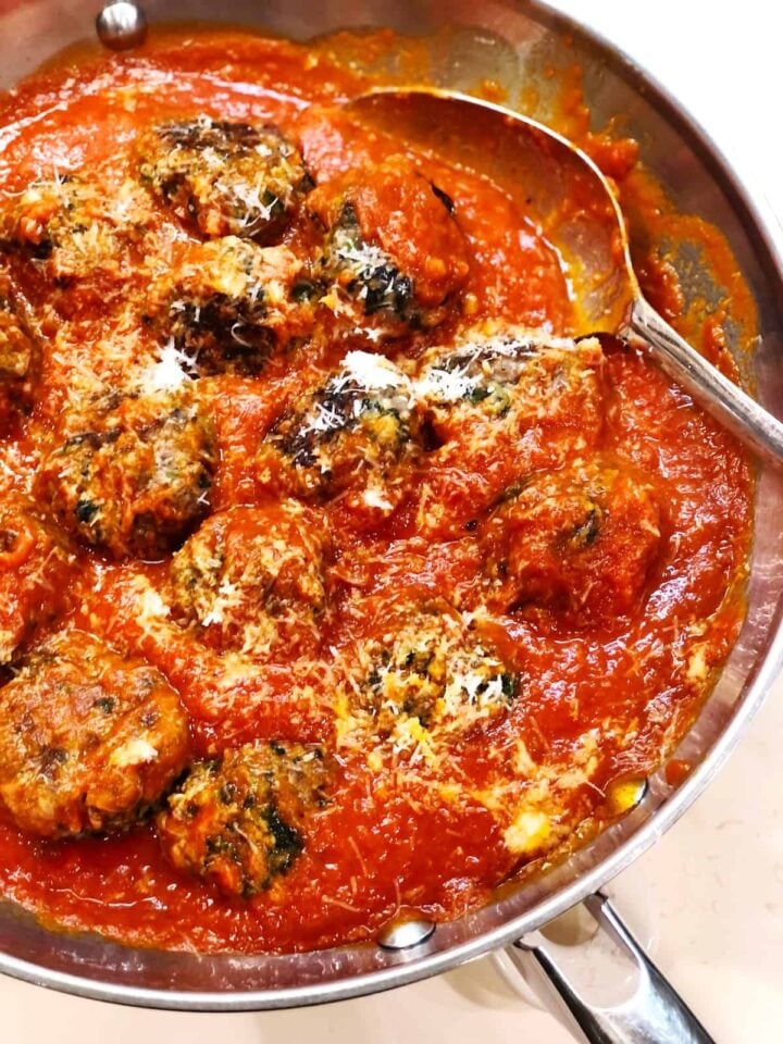 top view of ricotta meatballs with spinach 