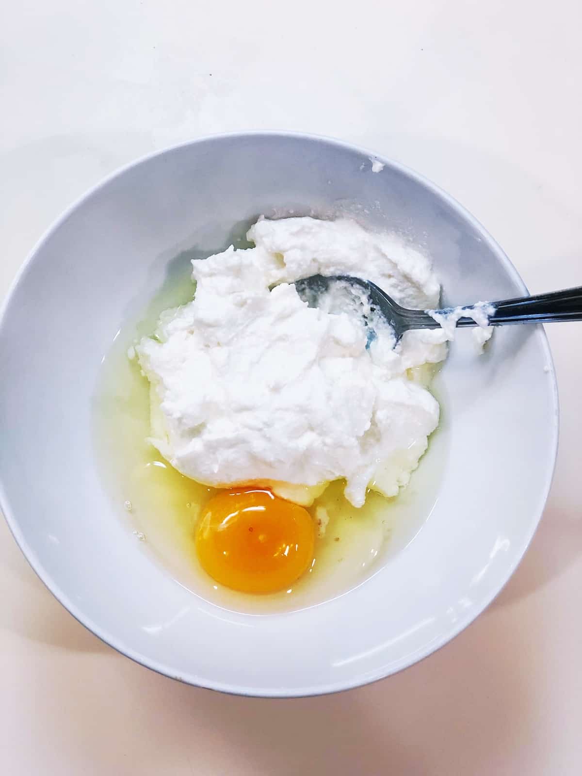 wet ingredients for spinach and ricotta meatballs