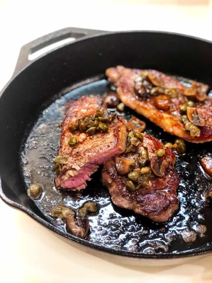 pan seared steak cut in half