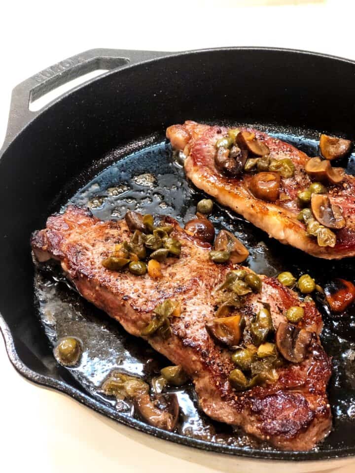 pan seared steak in cast iron pan