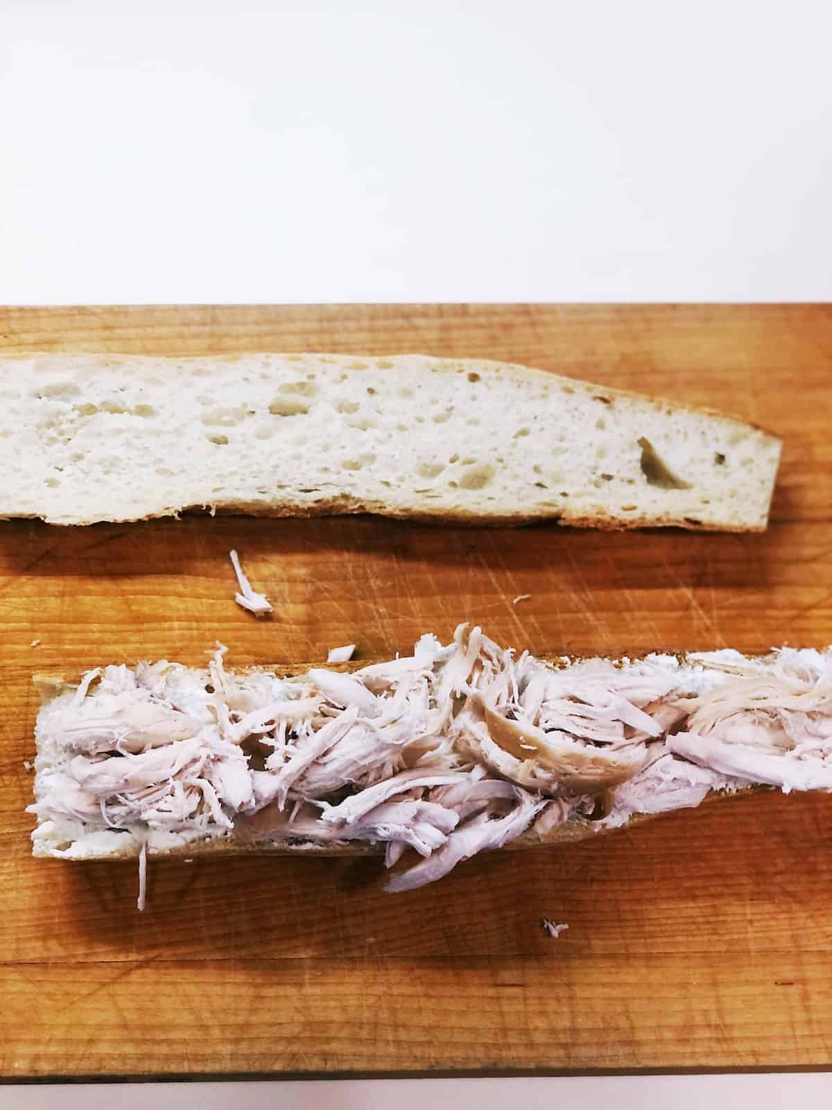 chicken on top of baguette