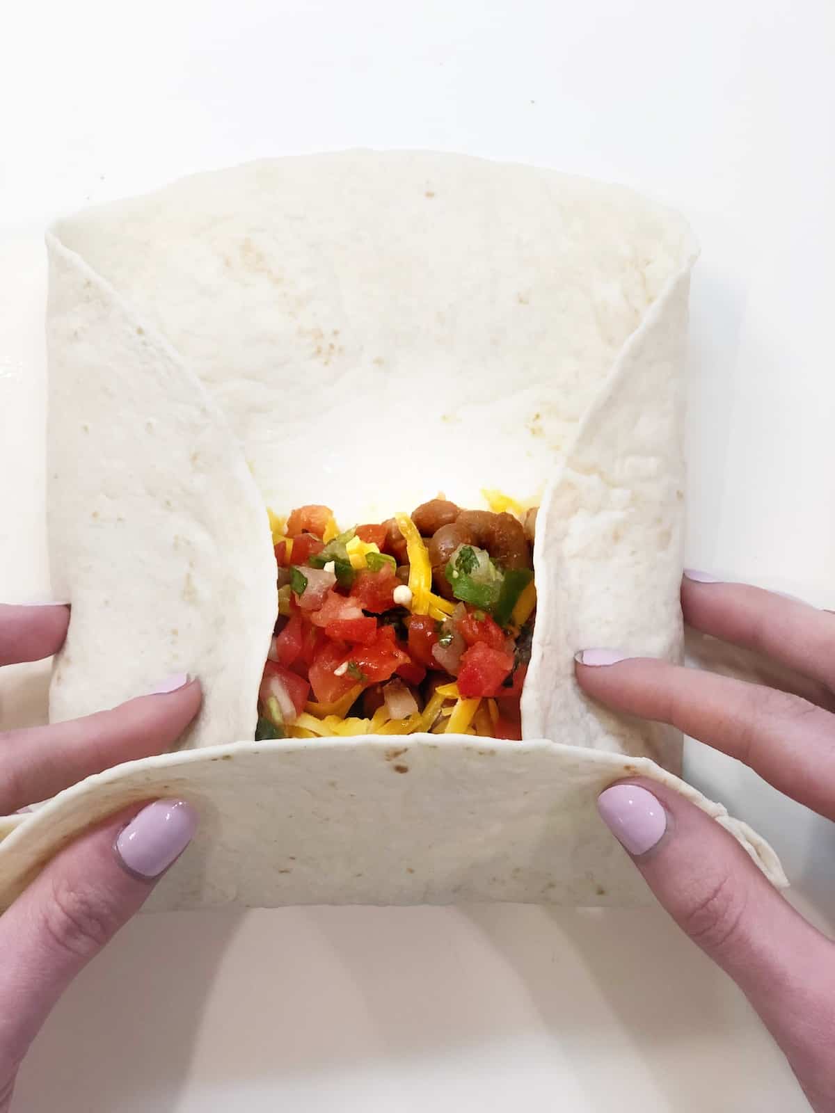 step 2 in folding a burrito