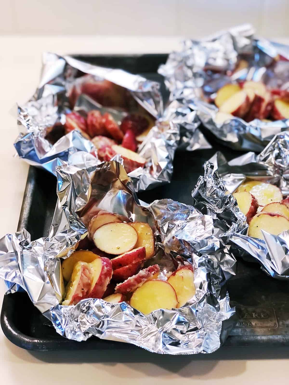 making grilled potato foil packets