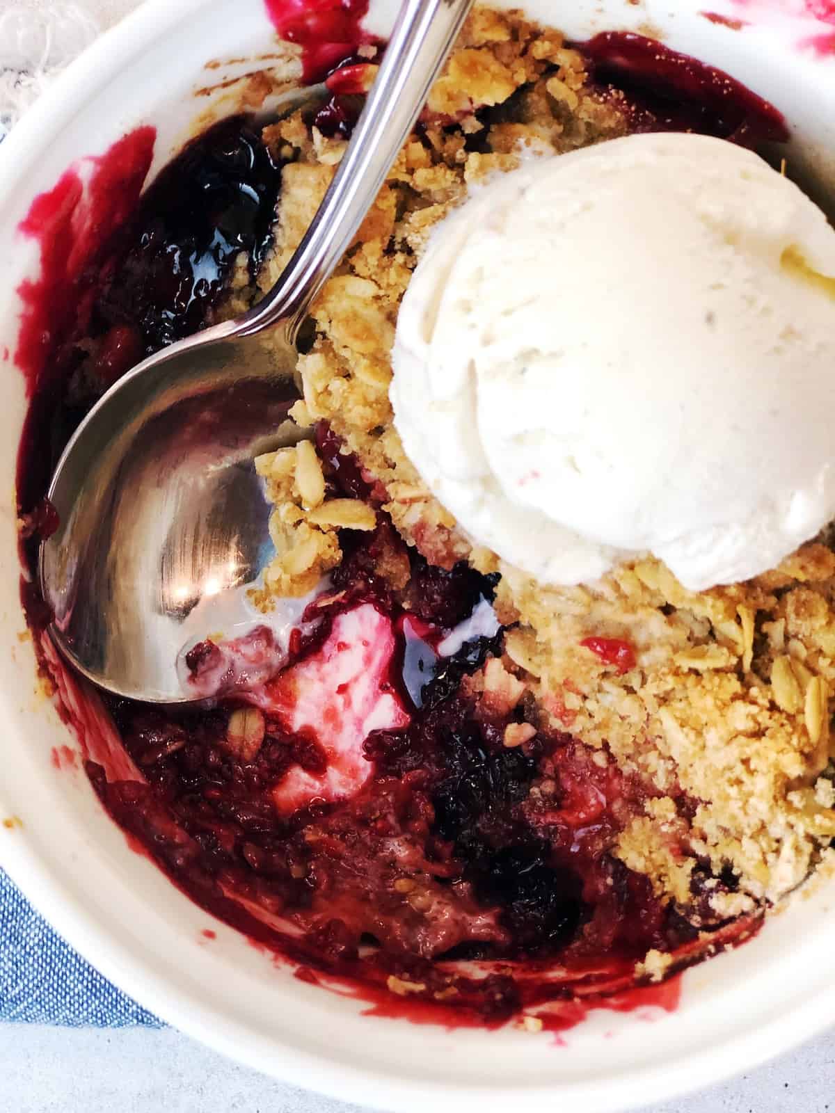 mixed berry crisp with ice cream