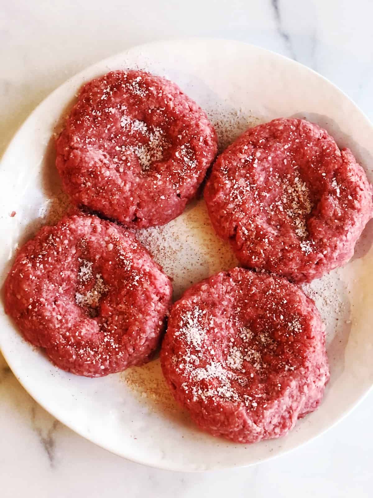 hamburger patty with seasoning