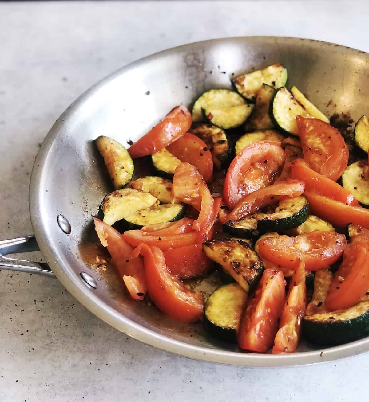 side view of zucchini and tomatoes