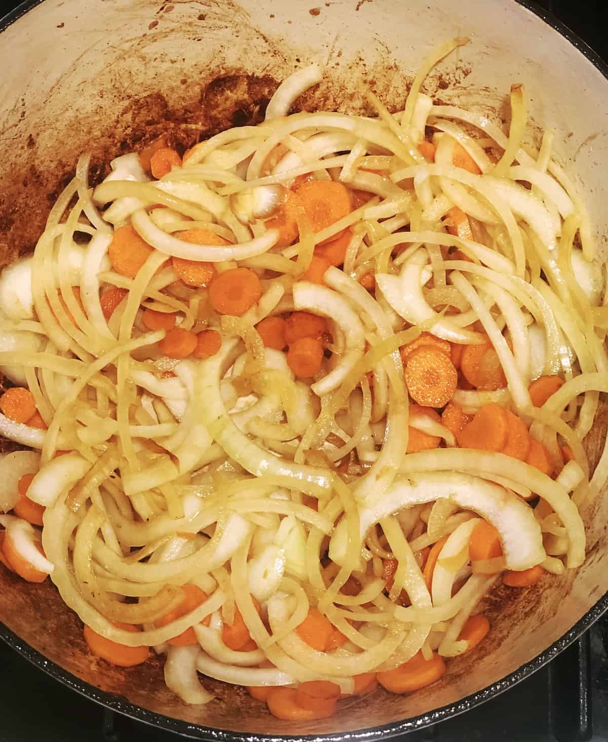 sauteing onions and carrots for provencal stew