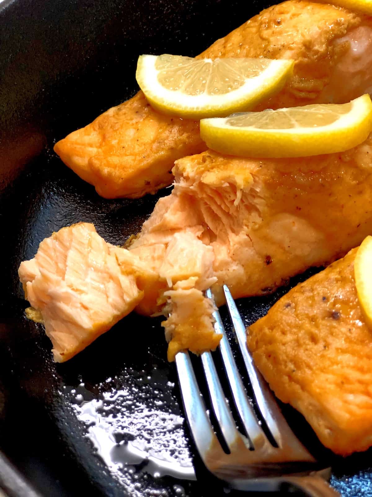 closeup of tender cast iron salmon