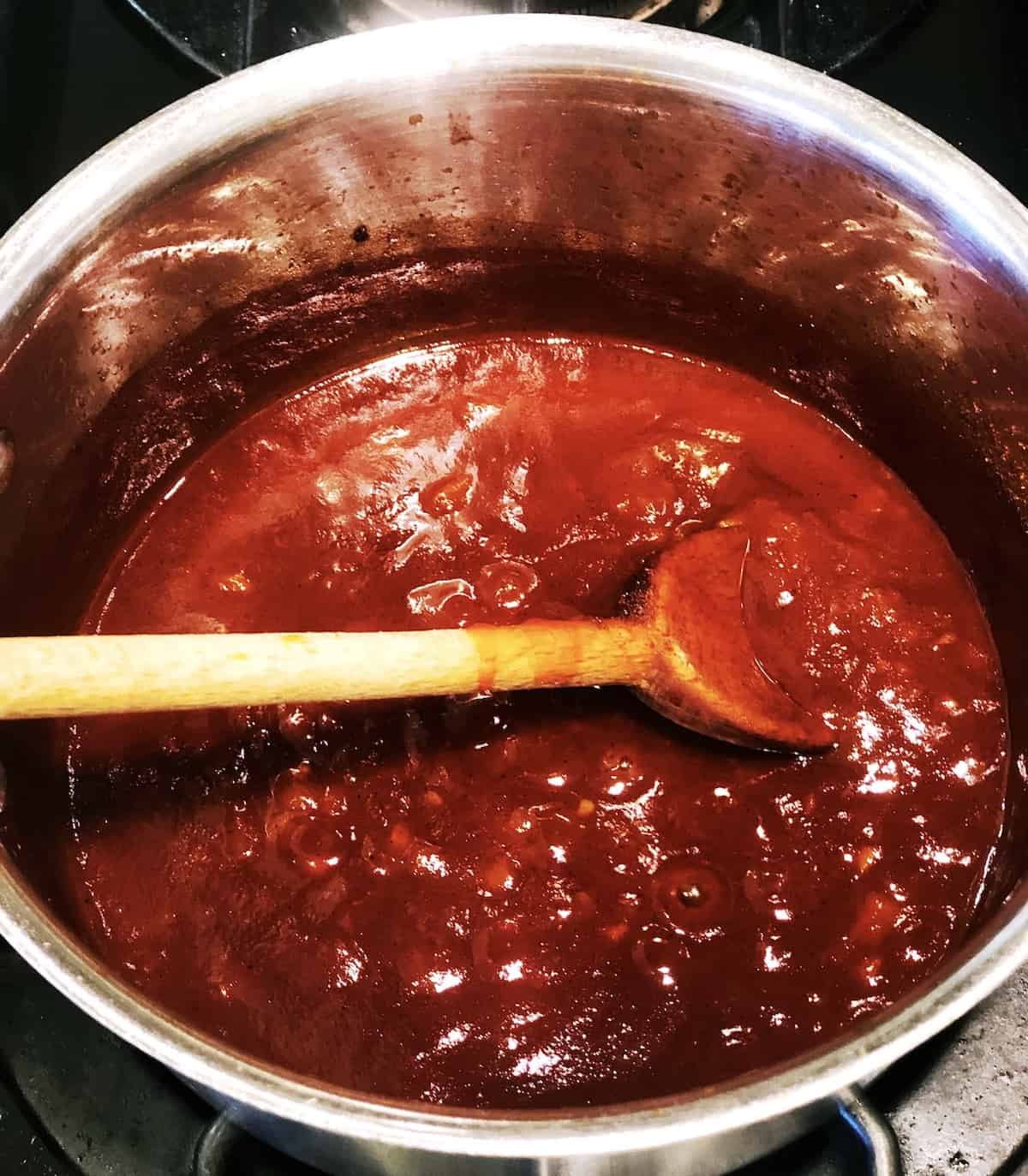 stirring bbq sauce