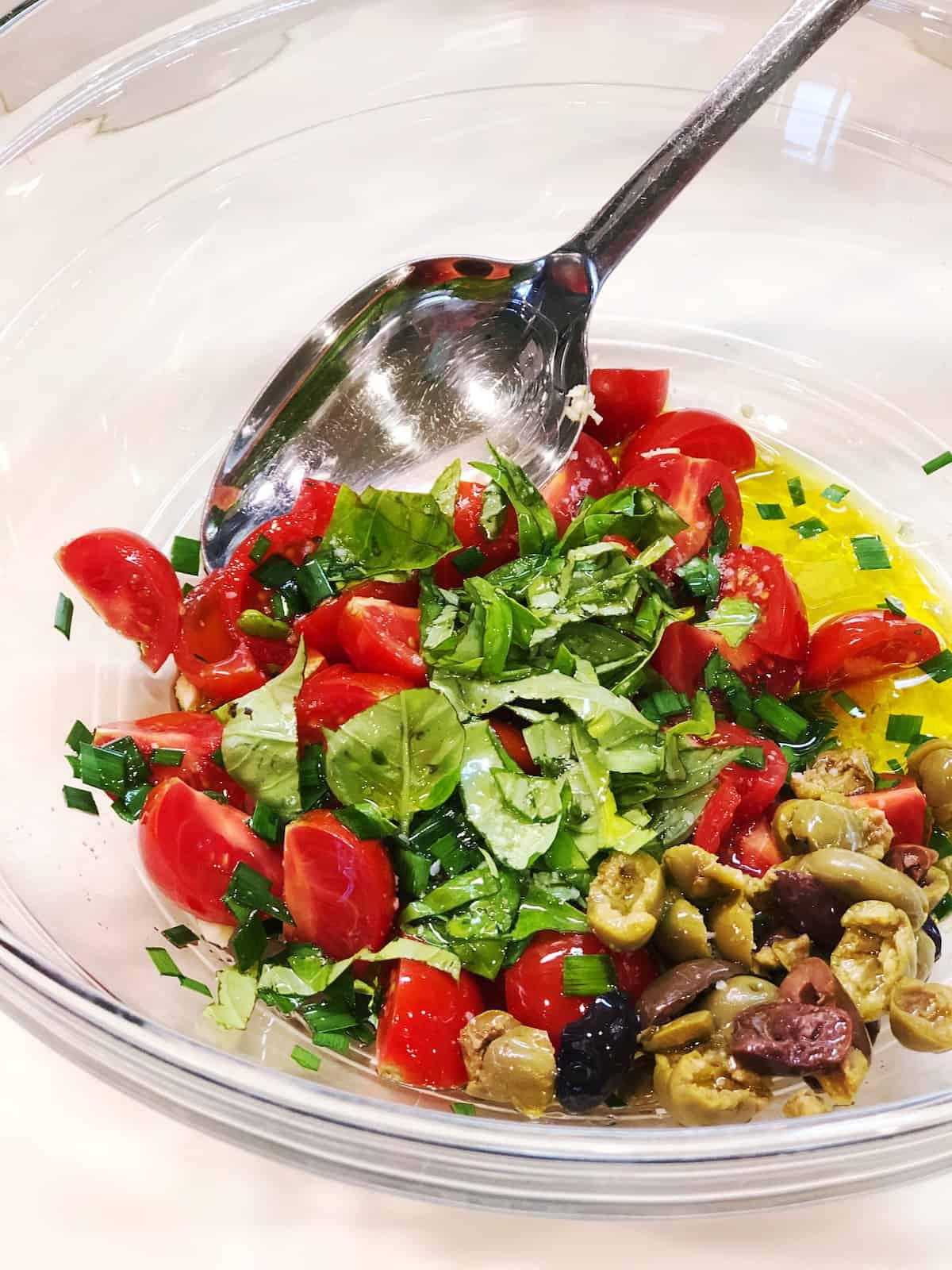 checca sauce ingredients in a bowl