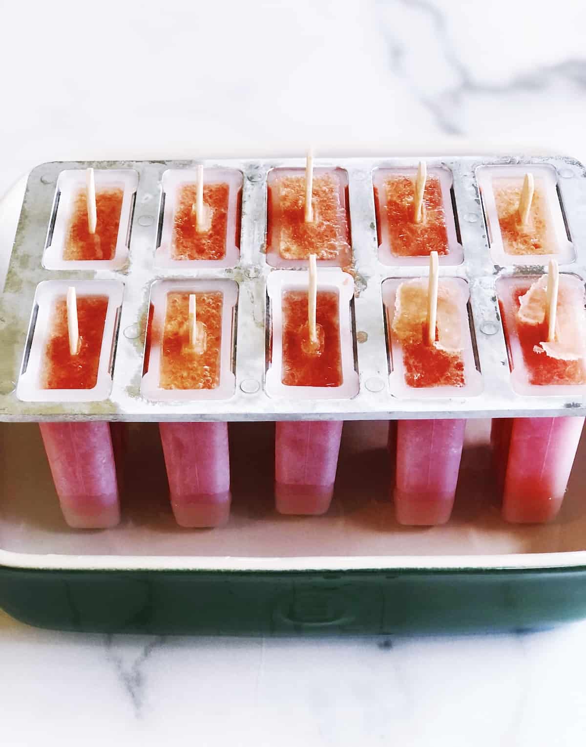 releasing watermelon popsicles from mold
