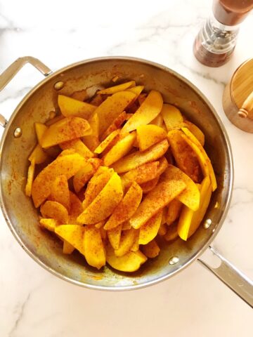 turmeric potatoes in pan