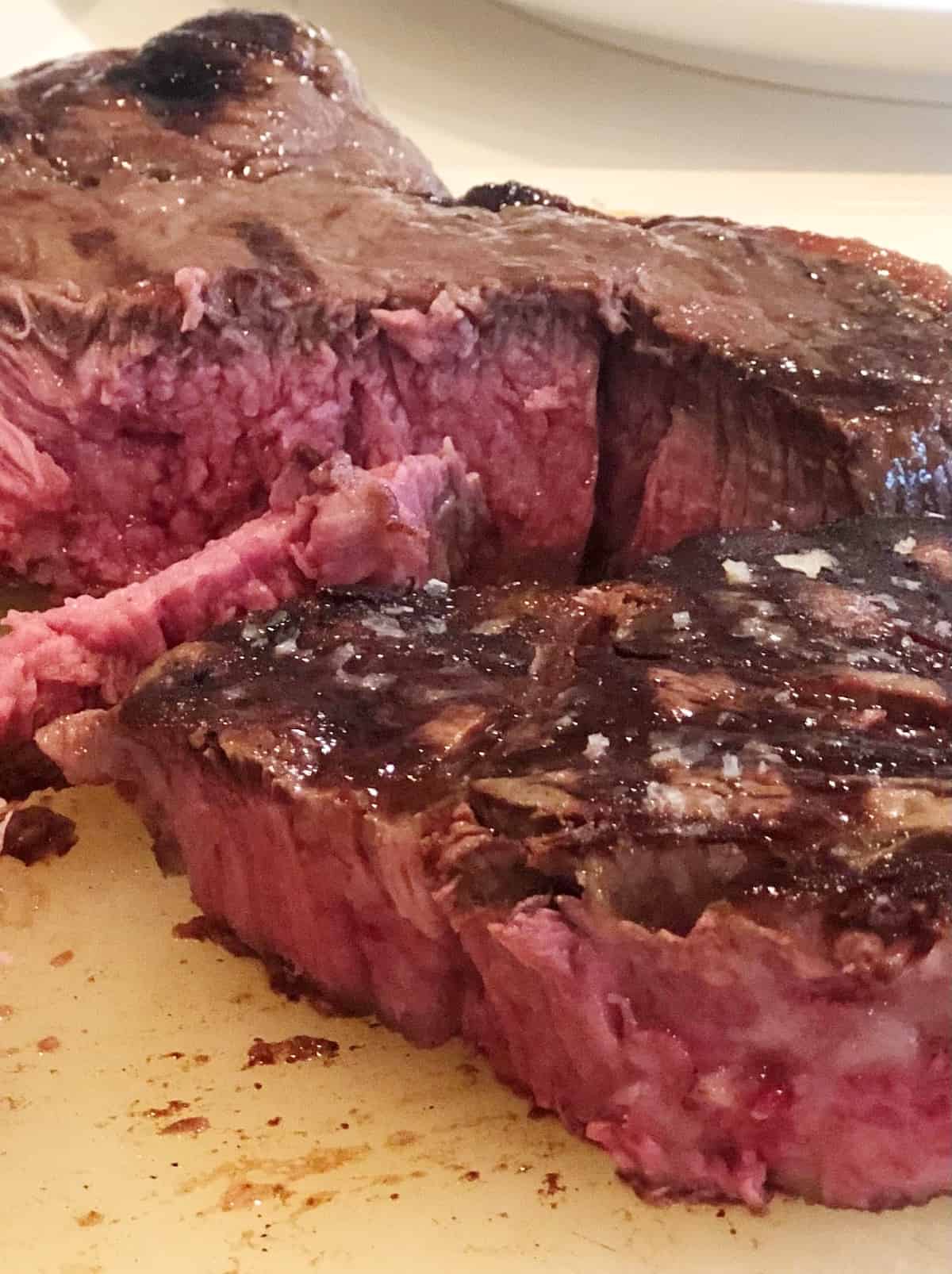 closeup of t bone steak cooked