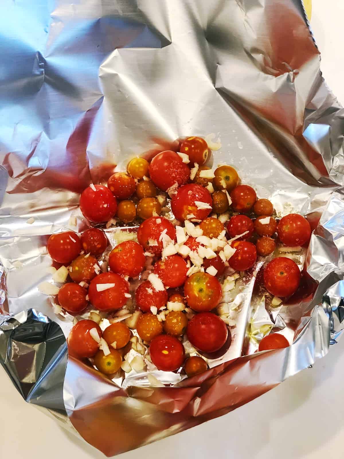 tomatoes and garlic in foil