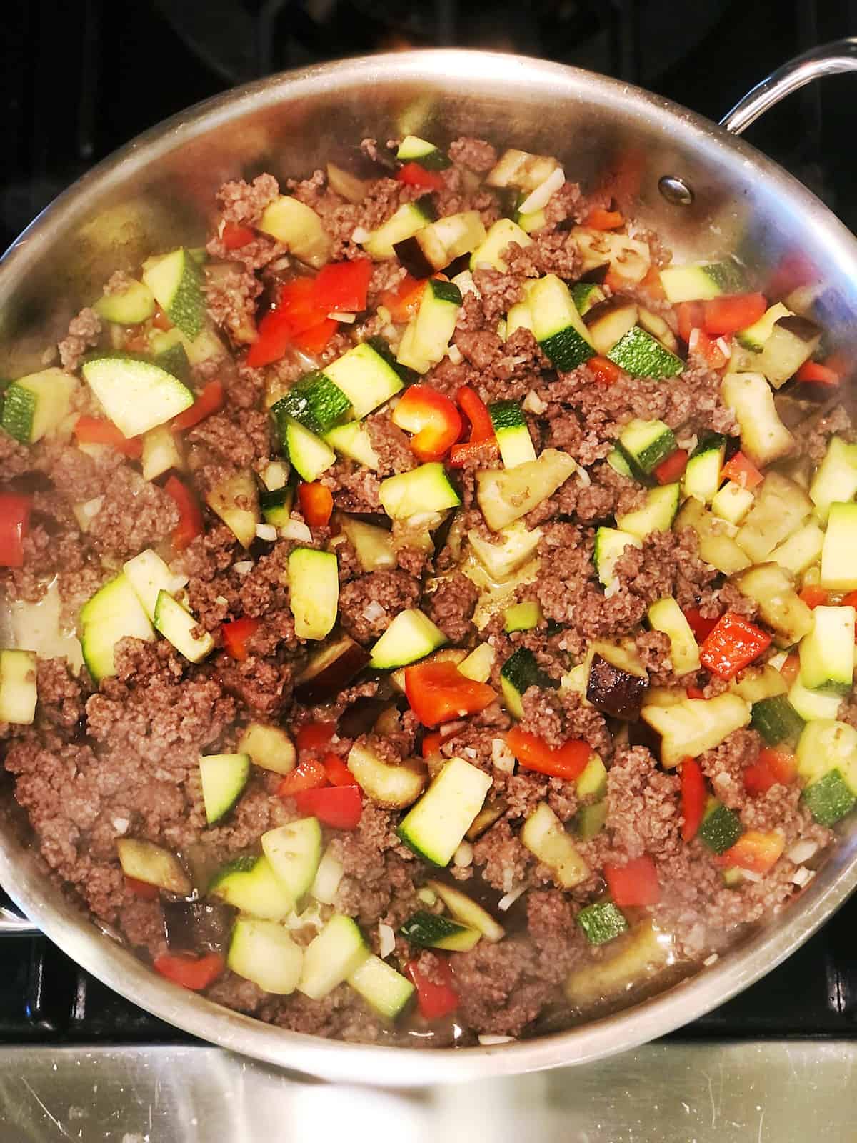 cooking veggie pasta sauce