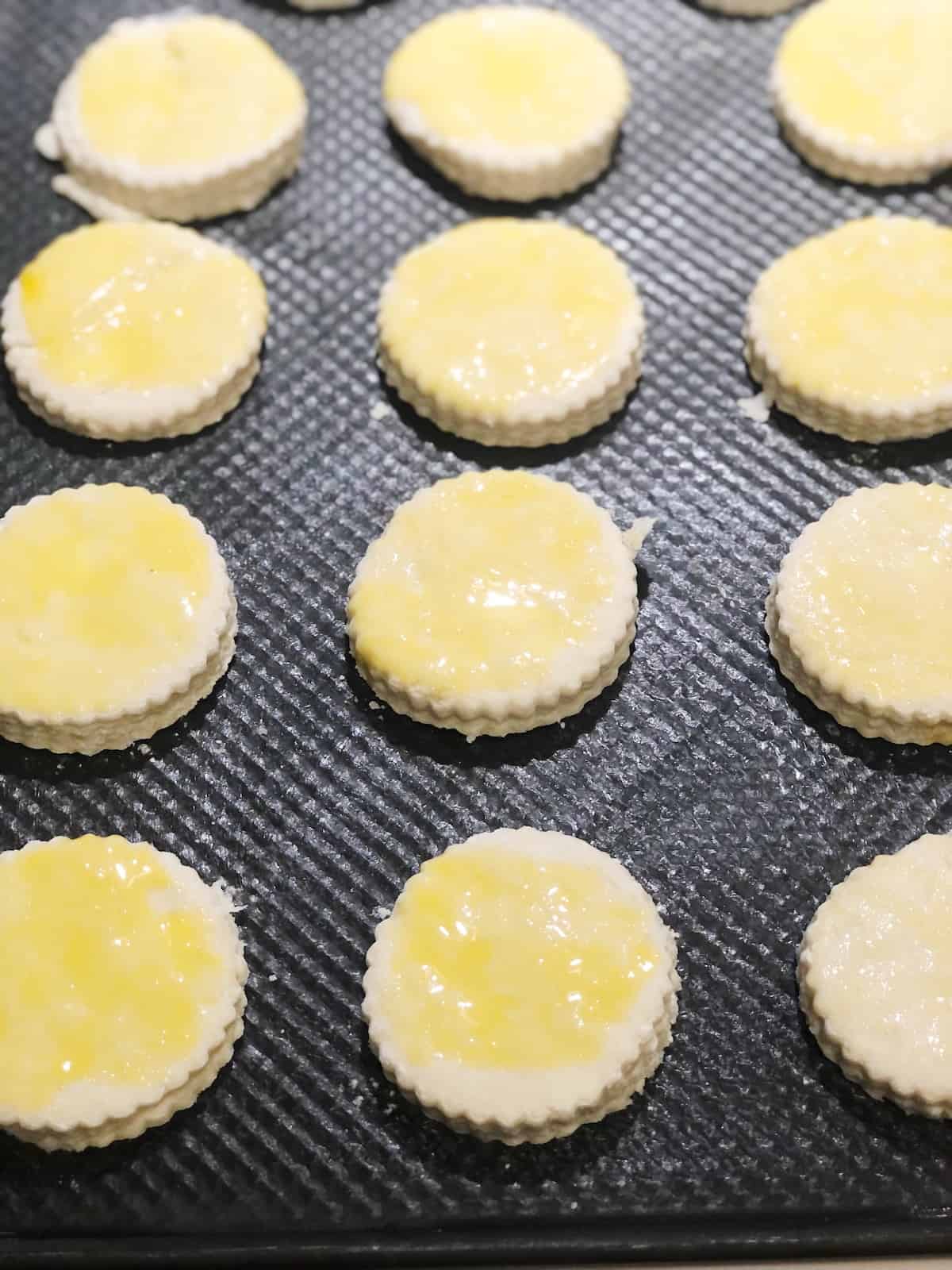 Biscuits on a baking sheet.