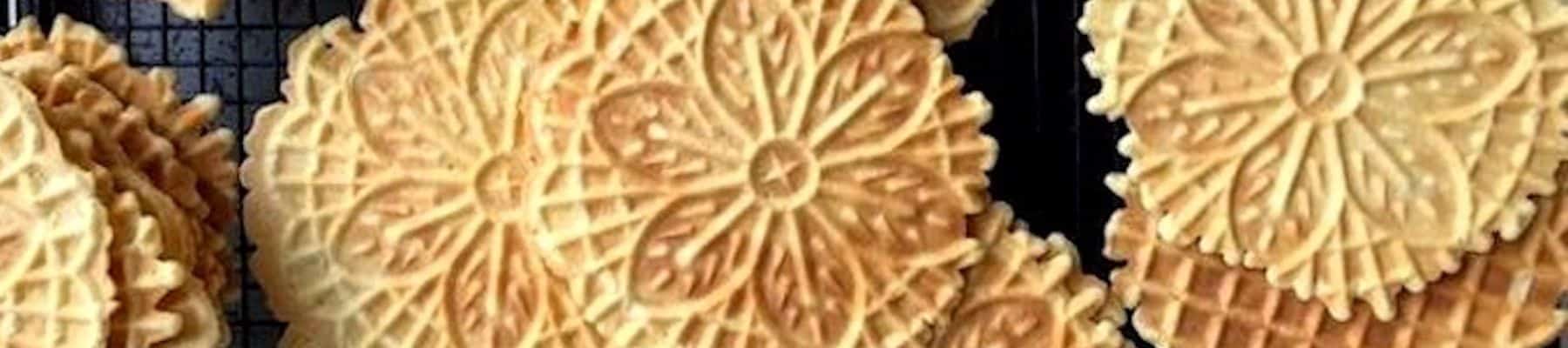 A group of cookies are drying on a rack.