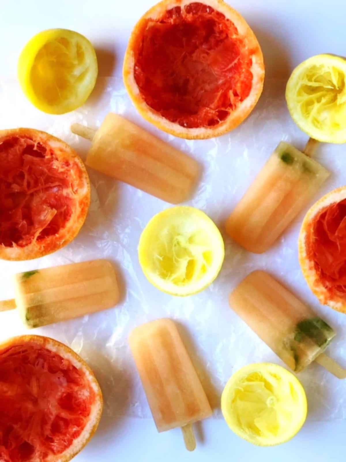 Grapefruit popsicles with lemons and oranges.