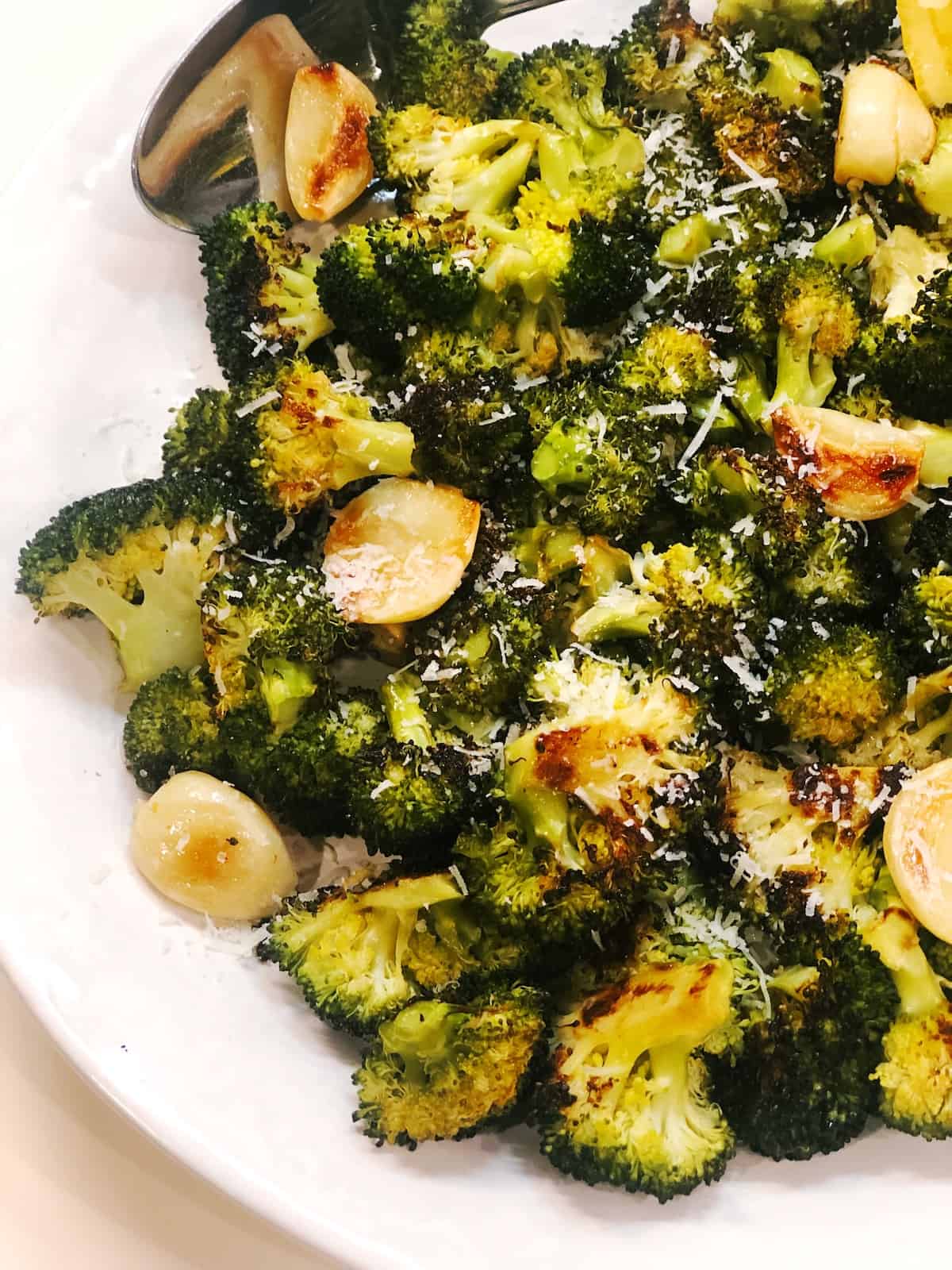 A plate of broccoli and garlic.