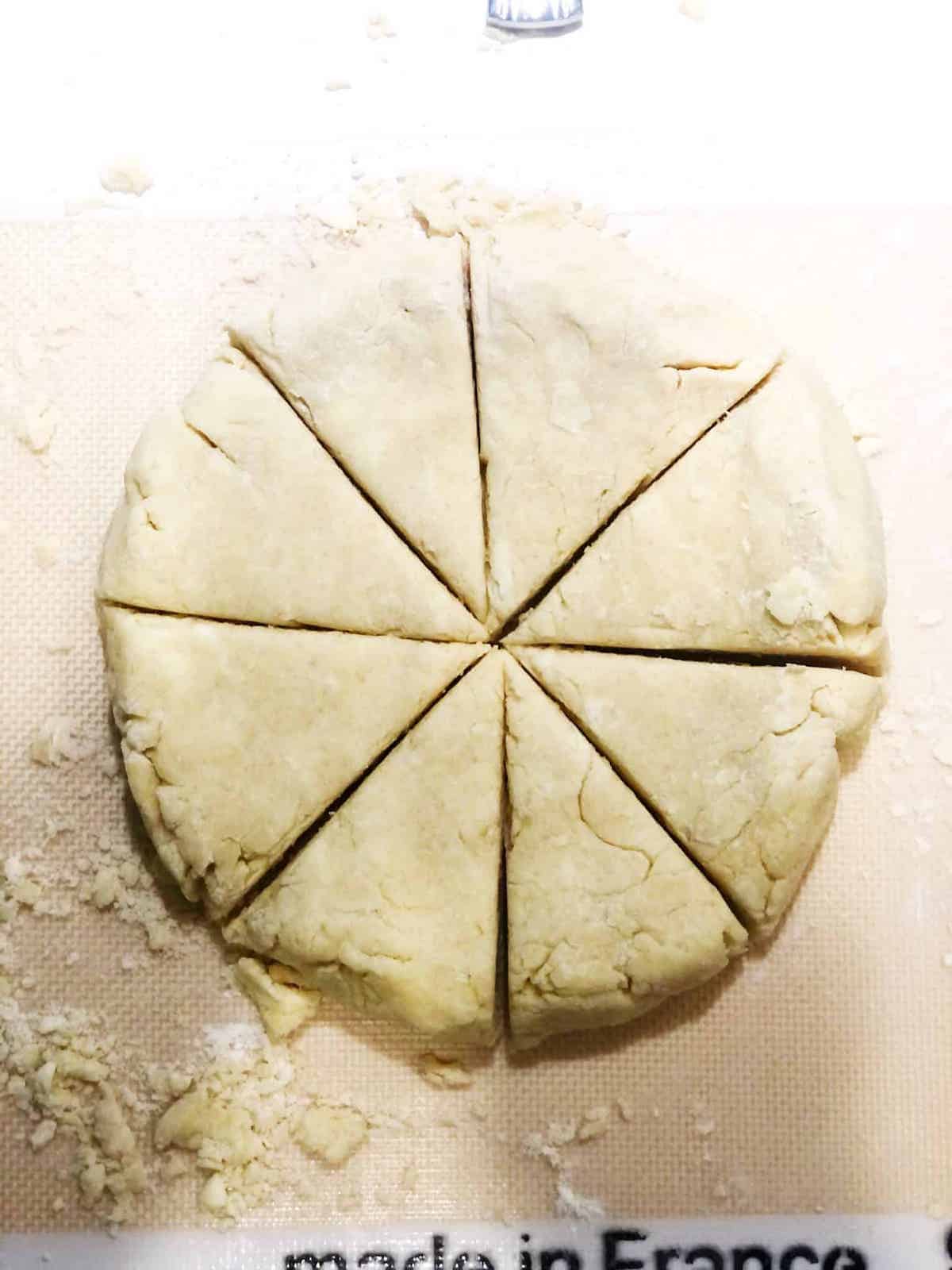 A piece of dough on a baking sheet.