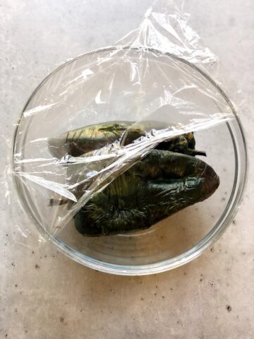 Oven roasted poblano peppers in a bowl