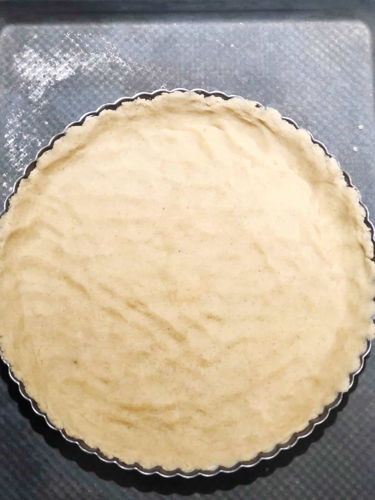 Shortbread crust pressed into pan.