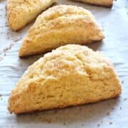 Vanilla scones on a sheet pan.