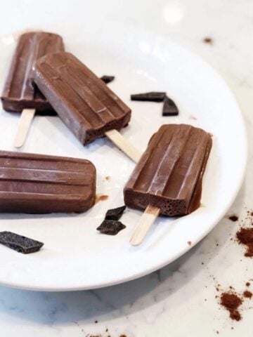 coconut milk fudge bars on a plate.
