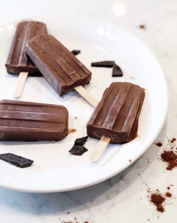 coconut milk fudge bars on a plate.