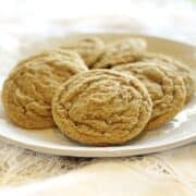 Closeup view of nutmeg sugar cookies on a plate.