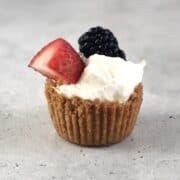A berries and cream cookie cup by itself assembled on the counter.