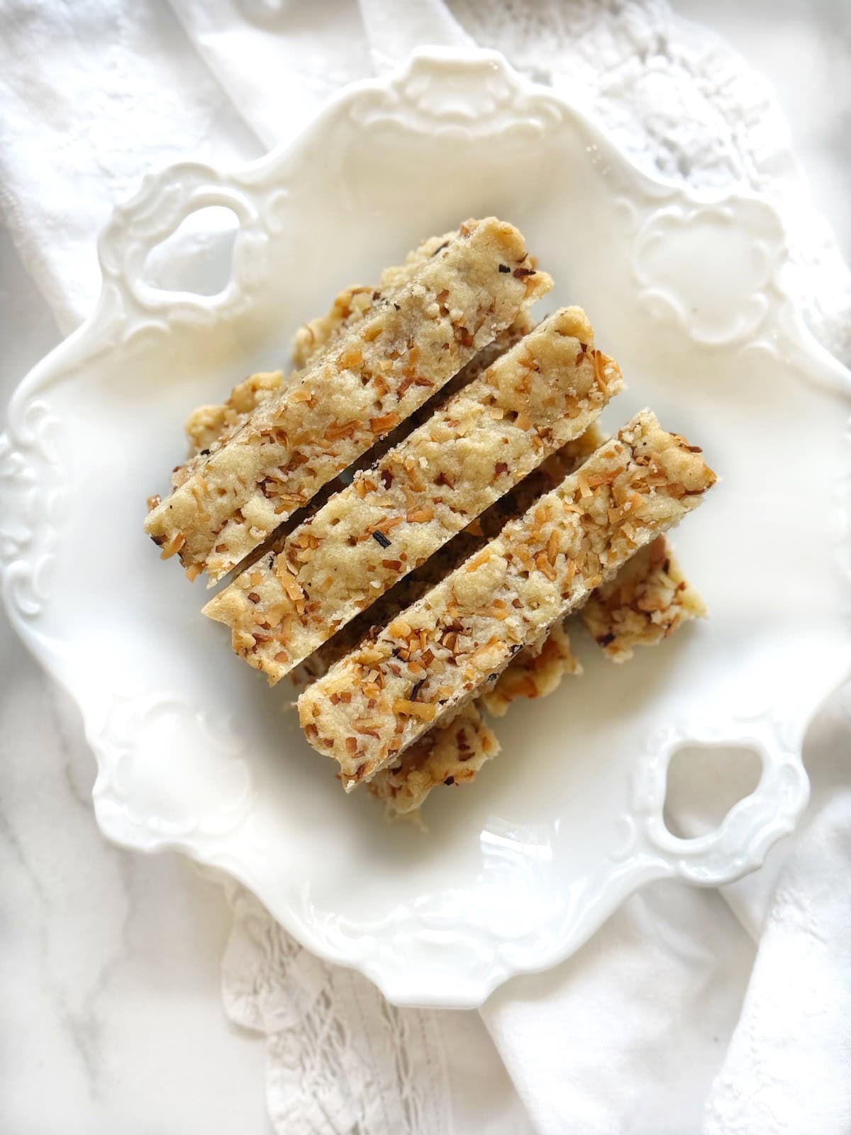 Coconut shortbread on a plate.