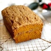 Pumpkin streusel bread on a cooling rack.