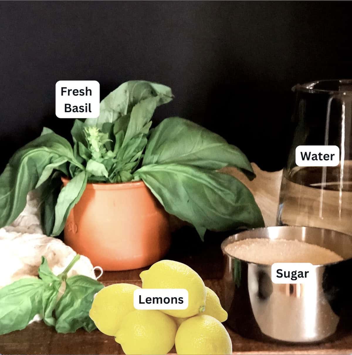 Ingredients for the basil lemonade on the counter.
